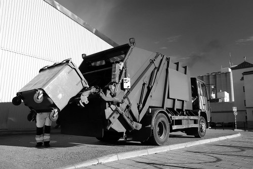 Professional team preparing for flat clearance in West Ham