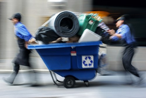 Workers sorting recyclables at a local materials recovery facility